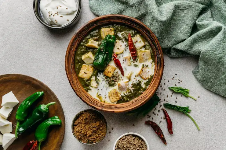 Palak Paneer half plate fresh and creamy Indian curry from Madan Vaishno Dhaba